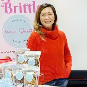 Tam of Tam's Sweets at holiday market